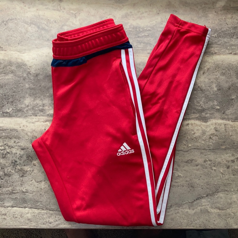 Red adidas track pants